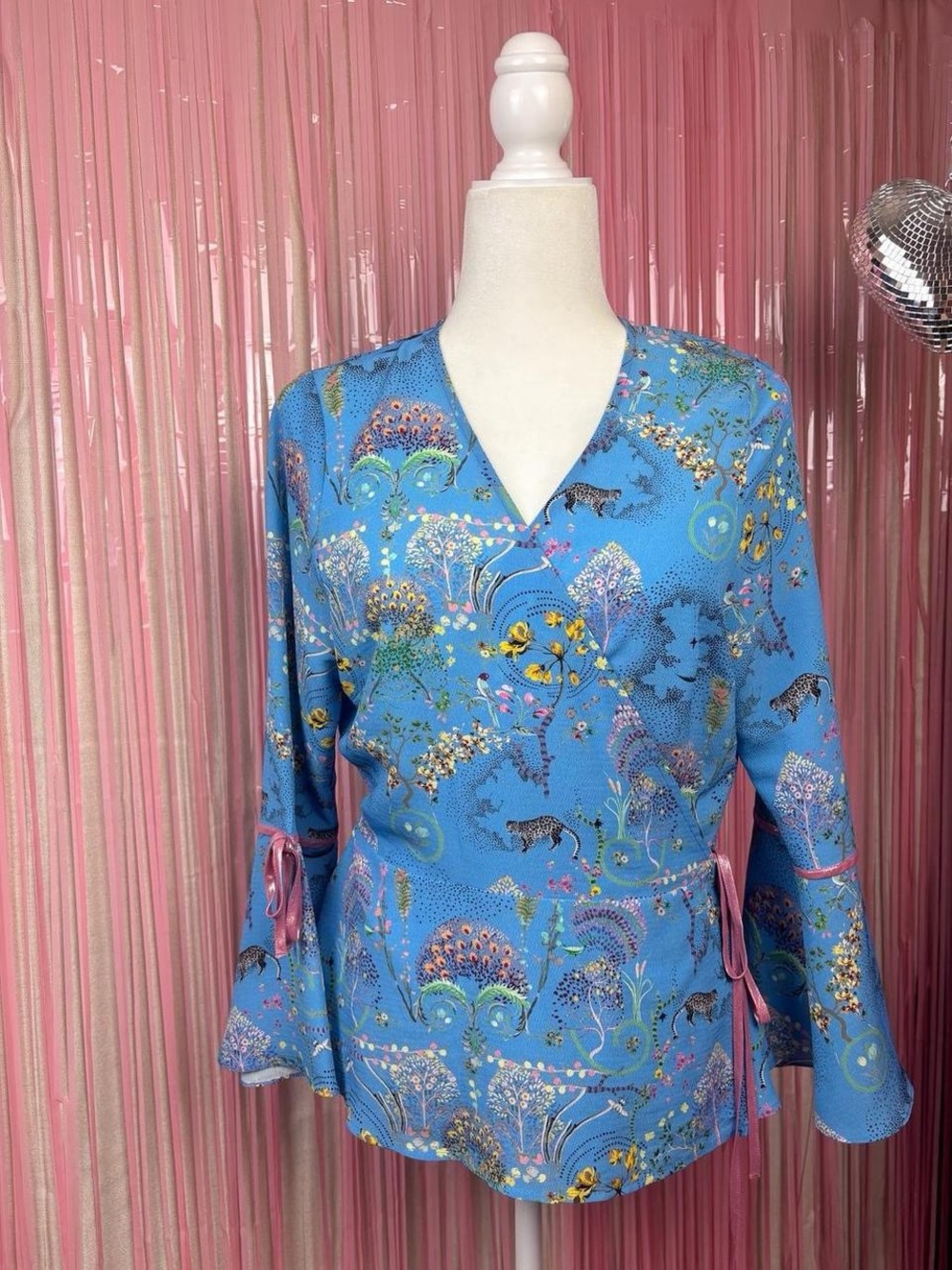 Topshop Blue animal motif wrap top fits like an 8-10